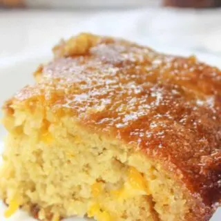 Gluten Free Mandarin Cake is a very quick and easy recipe to make. Loaded with mandarin oranges it is a nice burst of citrus any time of the year.