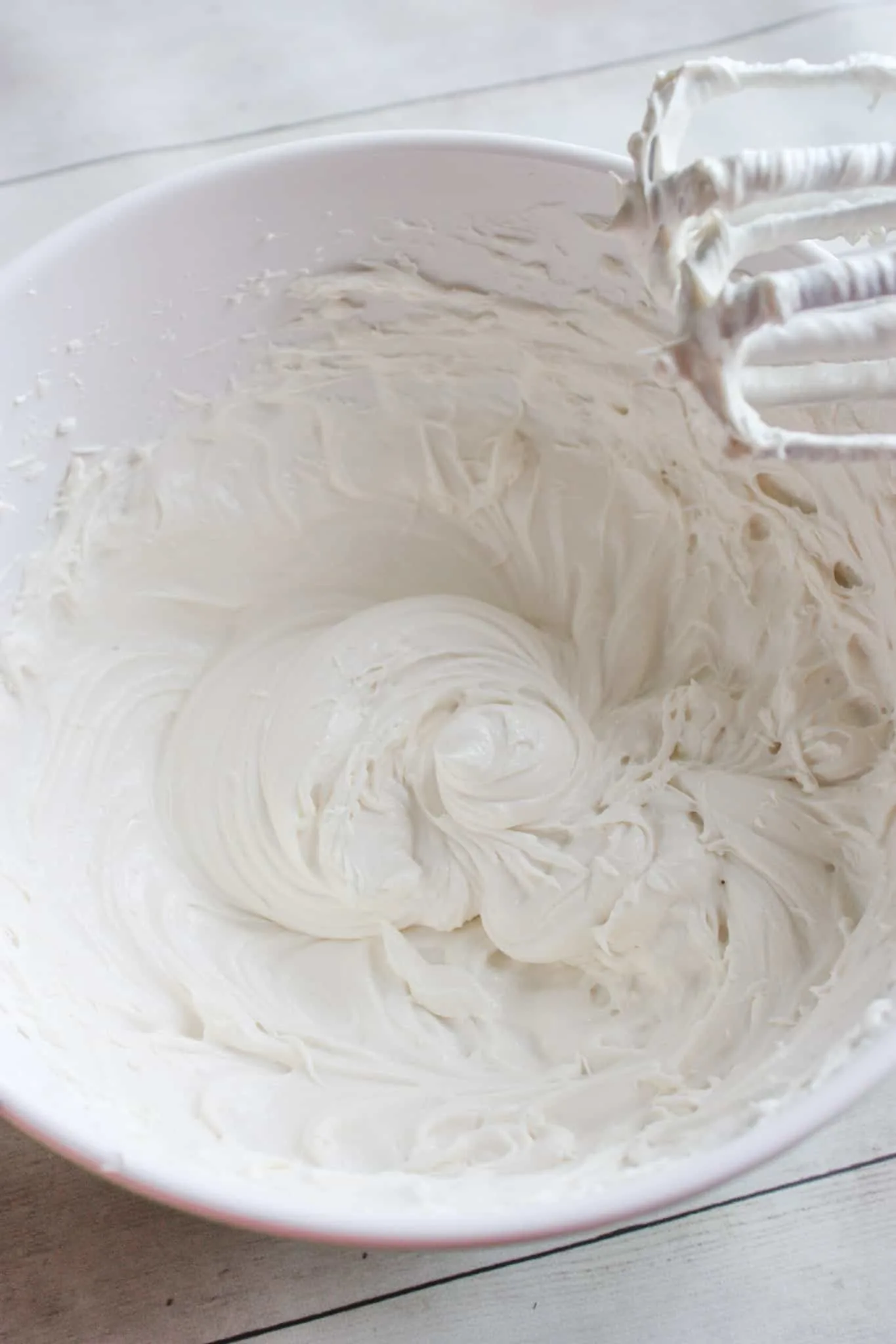 Creaming the dairy free cream cheese and granulated sugar.