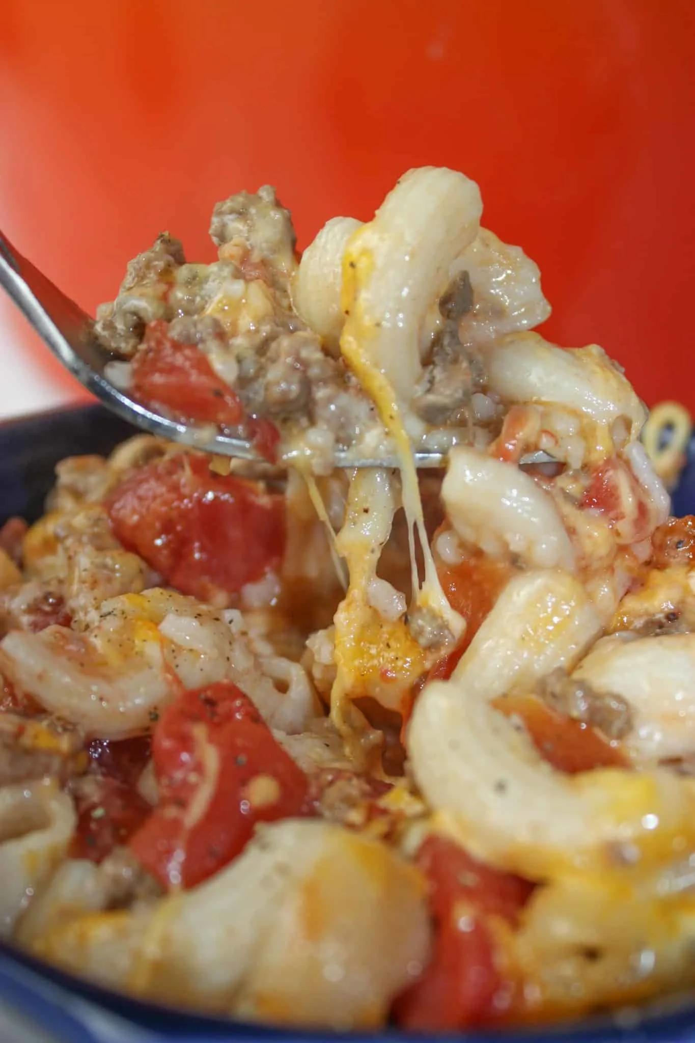 Baked Macaroni and Cheese is a quick and easy recipe your whole family will enjoy.  This gluten free meal is loaded with elbow pasta, ground beef, tomato and cheese to create a hearty meal for any day of the week.