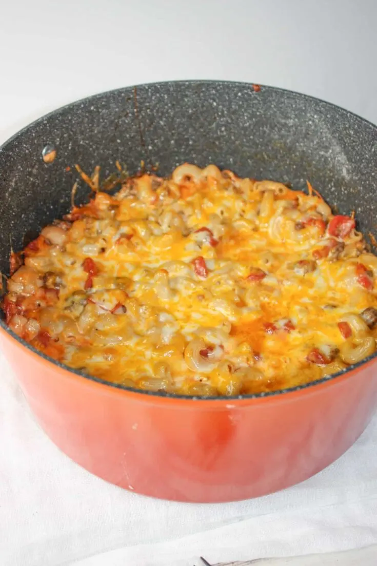 Baked Macaroni and Cheese is a quick and easy recipe your whole family will enjoy.  This gluten free meal is loaded with elbow pasta, ground beef, tomato and cheese to create a hearty meal for any day of the week.