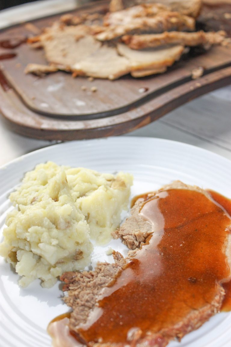 Instant Pot Beef Round Roast with Gravy takes a tougher cut of beef and turns it into a moist and tender main course.  This pressure cooker recipe makes it easy to serve up Sunday Dinner any day of the week!