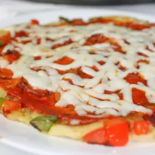 Craving pizza but don't have ingredients for pizza dough?  This may be the right recipe for you!  Pizza crepes create nice light gluten free pizzas that can be made easily and quickly.
