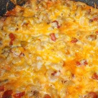 Baked Macaroni and Cheese is a quick and easy recipe your whole family will enjoy.  This gluten free meal is loaded with elbow pasta, ground beef, tomato and cheese to create a hearty meal for any day of the week.