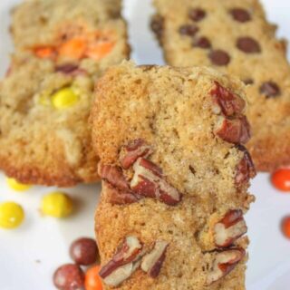 Banana Bars are an easy to make gluten free dessert or snack. This muffin or loaf variation is the perfect size to pack in school lunches.