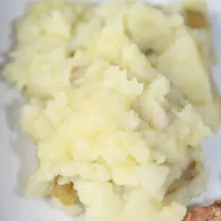 Mashed potatoes are a staple side dish in many of our homes.  Lazy Mashed Potatoes is a quick and easy recipe that skips the peeling and boiling steps. 