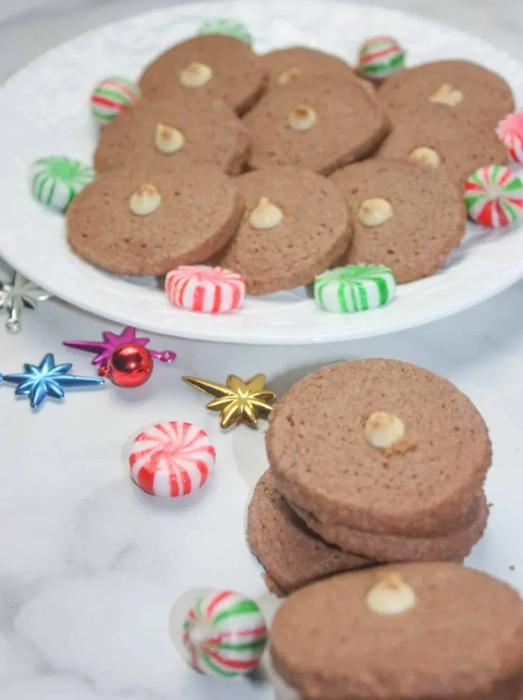 Chocolate Shortbread Cookies are a light, melt in your mouth variation of traditional shortbread.  This gluten free holiday recipe is a delicious addition to any dessert tray.