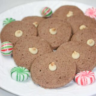 Chocolate Shortbread Cookies are a light, melt in your mouth variation of traditional shortbread.  This gluten free holiday recipe is a delicious addition to any dessert tray.