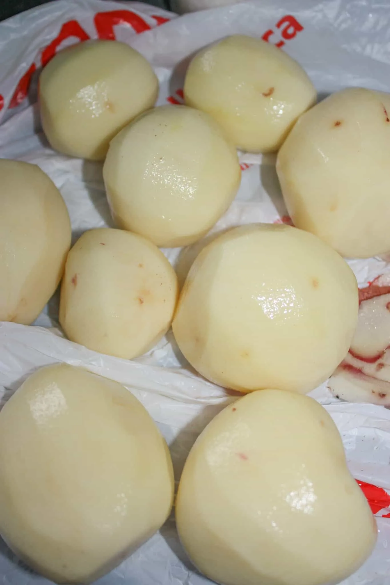 Peeling the potatoes.