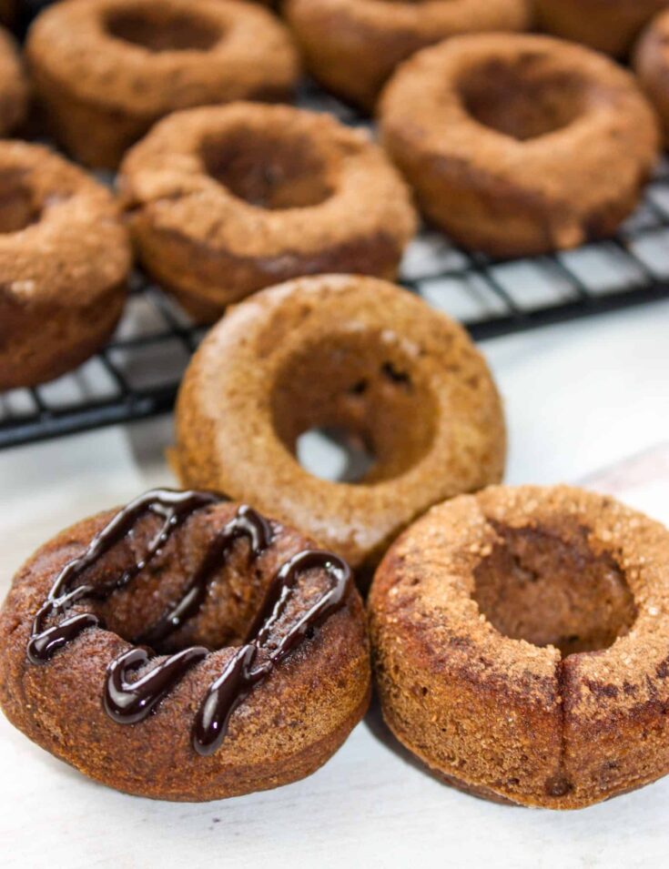 Chocolate Pumpkin Donuts are mini bites of gluten free deliciousness!  These little morsels can be eaten for breakfast, a snack or as a dessert.  Dress them up to your liking and for the occasion.