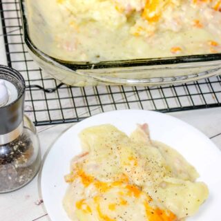 Cooking Scalloped Potatoes in the Instant Pot is a real time saver for this comfort food casserole.  Instant Pot Cheesy Bacon Scalloped Potatoes can be cooked quickly and added as a side dish any day of the week.