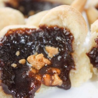 Skor Butter Tarts are a tasty variation of regular butter tarts.  This gluten free dessert pastry will be a hit with young and old alike.
