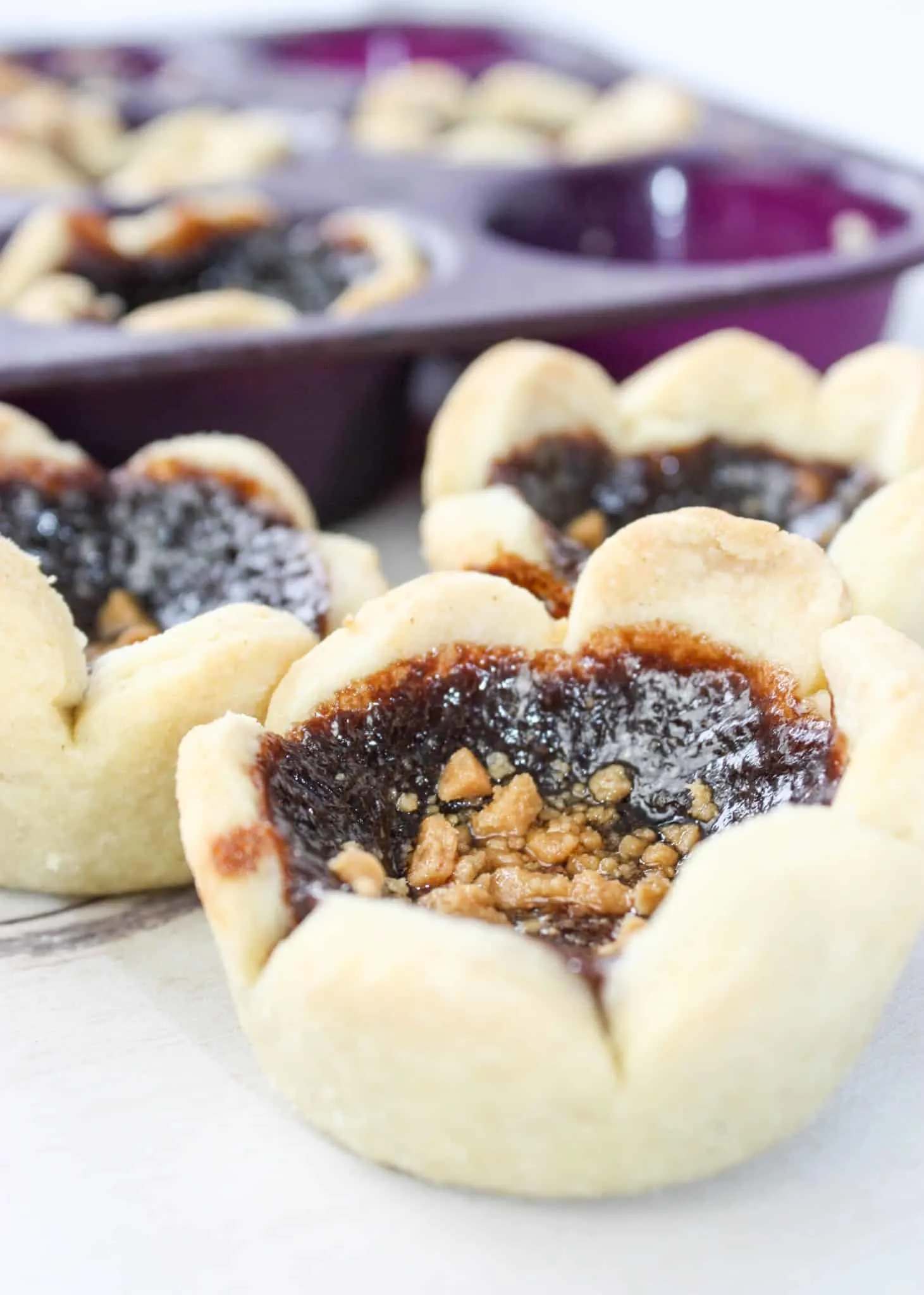 Skor Butter Tarts are a tasty variation of regular butter tarts.  This gluten free dessert pastry will be a hit with young and old alike.