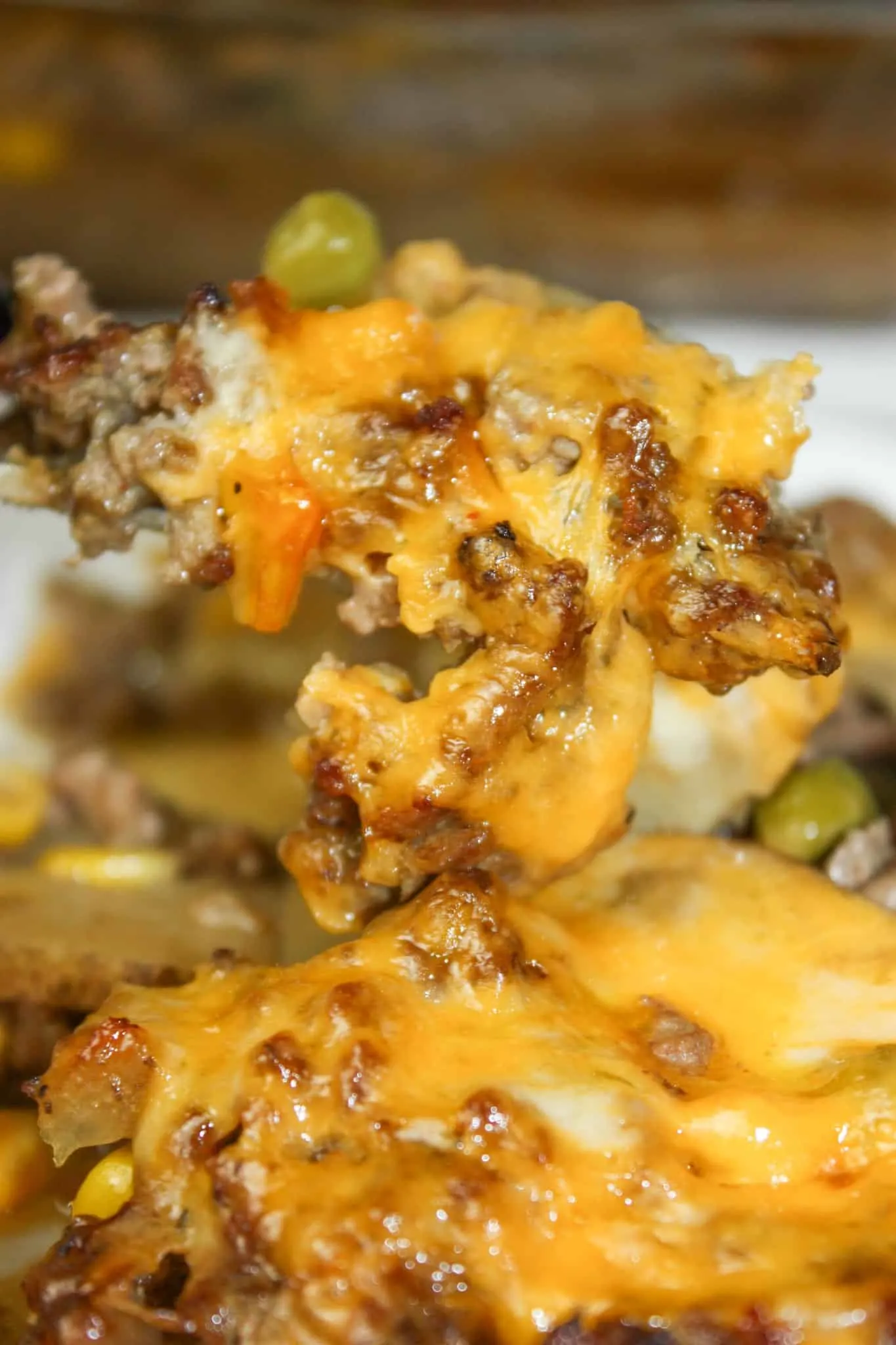 Ground Beef Casserole is a layered dinner recipe that is loaded with potatoes, vegetables and beef.  The gluten free sauce or gravy not only adds moisture but flavour as well.
