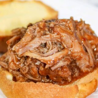 Instant Pot Pulled Pork is a delicious gluten free pulled pork recipe.  The Instant Pot allows you to take a pork shoulder roast and turn it into a shredded masterpiece in less time than a slow cooker.