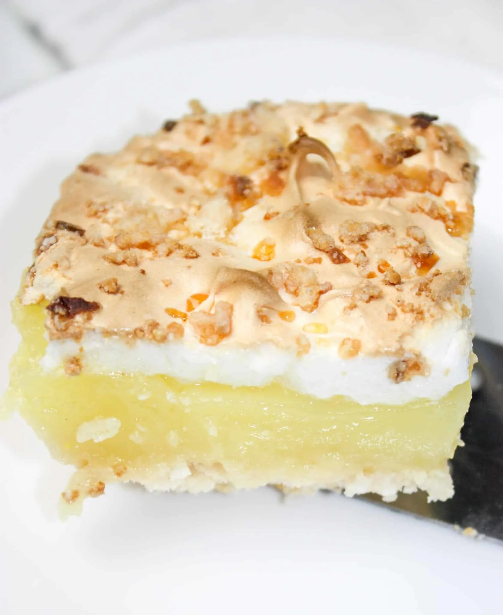 Lemon Pie Squares are a light citrus dessert that make a great ending to any meal.  This easy dessert is a tasty treat that really hits the spot in the spring and summer weather.