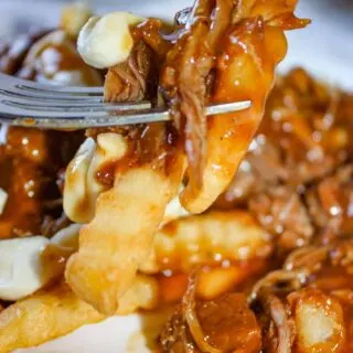 Pulled Pork Poutine is a great comfort food option when you don't feel like making a traditional meal.  