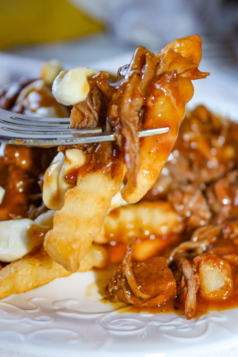 Pulled Pork Poutine is a great comfort food option when you don't feel like making a traditional meal.  