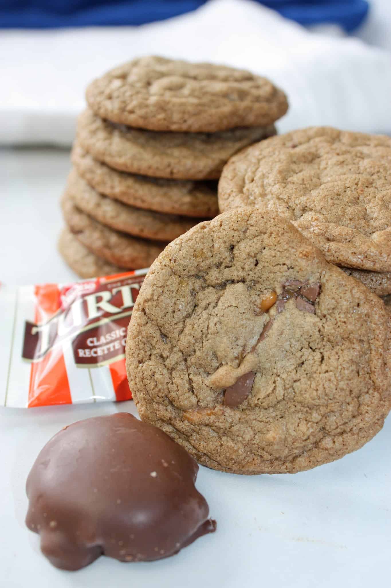Turtle Cookies take a popular chocolate candy and bake it into another classic dessert to create a decadent chocolate, caramel, pecan experience.