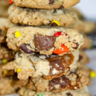Candy cookies are a nice crunchy cookie base loaded with oatmeal, M & M candies and chewy Turtles chocolates.  This gluten free dessert, or snack, is sure to be a hit in your home.
