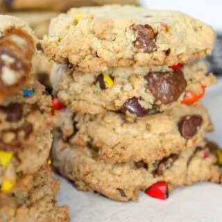 Candy cookies are a nice crunchy cookie base loaded with oatmeal, M & M candies and chewy Turtles chocolates.  This gluten free dessert, or snack, is sure to be a hit in your home.