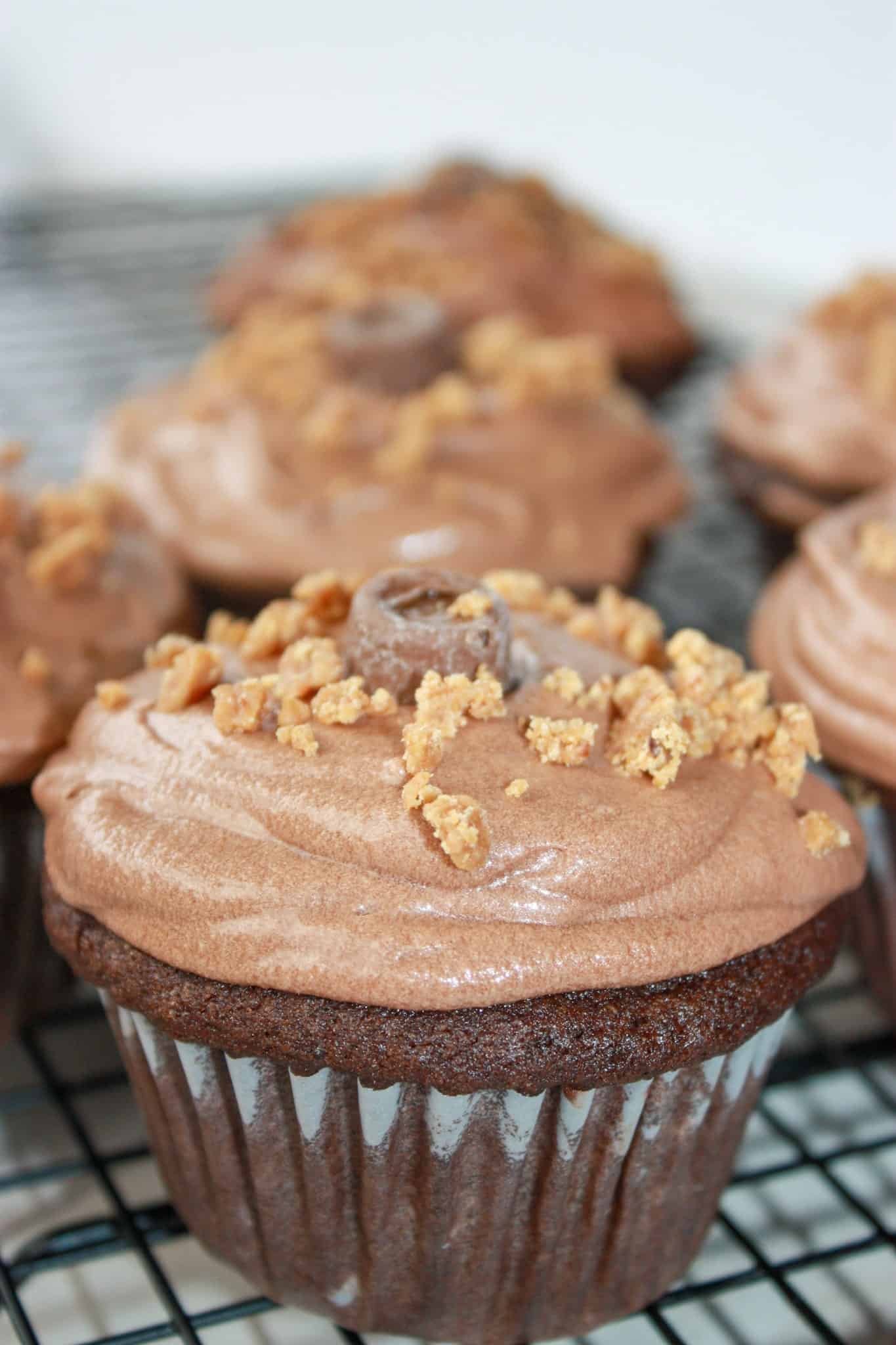 Chocolate Caramel Cupcakes make a light, moist dessert or snack.  This easy, gluten free recipe uses Rollo Candies and Kraft Caramels to create a decadent chocolate caramel treat.