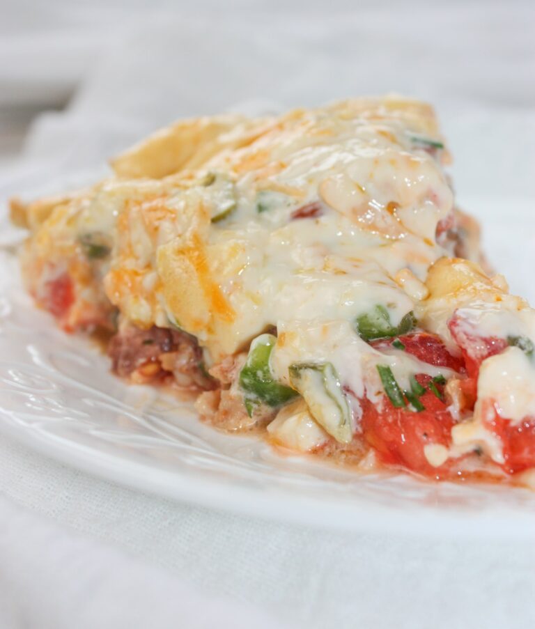 Tomato Pie is a versatile and tasty recipe that can easily be made gluten free with your choice of pie crust.  This cheesy, tomato dish can stand alone or complement any main course.