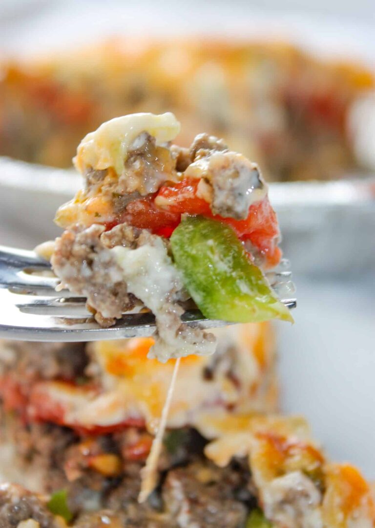 Beef and Tomato Pie is a delicious dinner recipe filled with ground beef, cheese, tomatoes and spices.