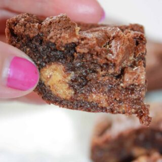 A popular flavour combination that I also enjoy is the blend of peanut butter and chocolate.  These gluten free Peanut Butter Brownies make a great addition to a dessert tray any time of the year!