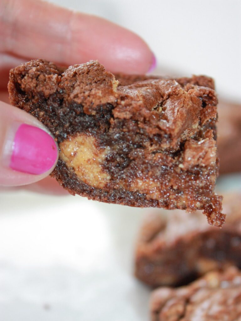 A popular flavour combination that I also enjoy is the blend of peanut butter and chocolate.  These gluten free Peanut Butter Brownies make a great addition to a dessert tray any time of the year!