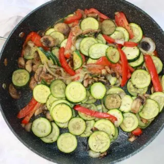 Zucchini Stir Fry is an easy side dish recipe that provides a great way to incorporate this seasonal vegetable into  your menu options.