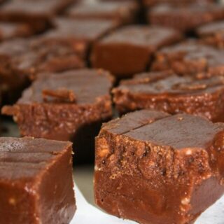 Dark Chocolate Fudge is a creamy, decadent treat that will earn you rave reviews.  This easy recipe does not require a candy thermometer and can be made in minutes.