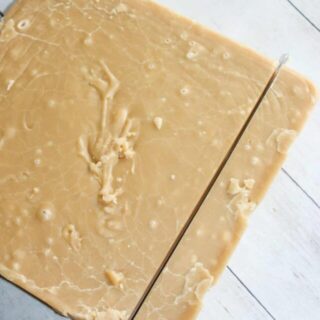 Banana Fudge is a smooth, sweet dessert square.  This flavourful candy treat is reminiscent of the marshmallow banana candies I used to eat as a child.