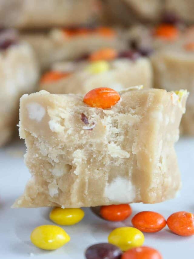 Peanut Butter Fudge is a creamy, decadent treat that will quickly be devoured.  This easy recipe does not require a candy thermometer and can be made in minutes.