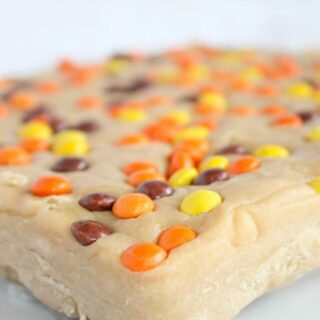 Peanut Butter Fudge is a creamy, decadent treat that will quickly be devoured.  This easy recipe does not require a candy thermometer and can be made in minutes.