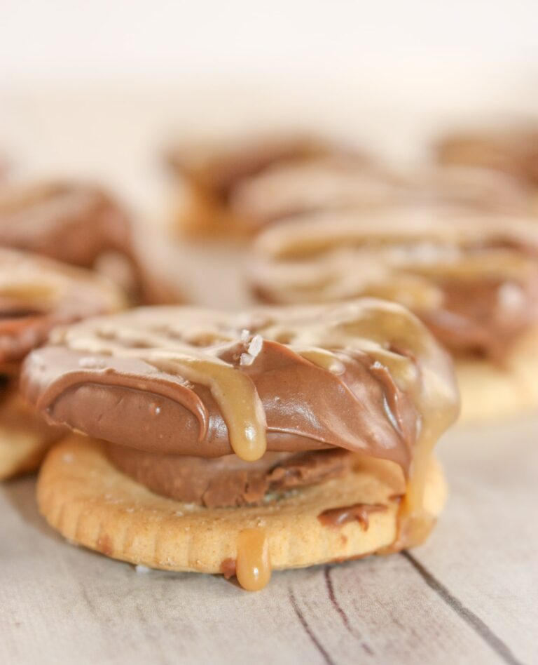 Dipped Rolo Stuffed Crackers are a more decadent version of the traditional Ritz stuffed cracker.  This gluten free version is a very tasty treat any time of the year, but it is a quick and easy recipe for Christmas dessert trays!  