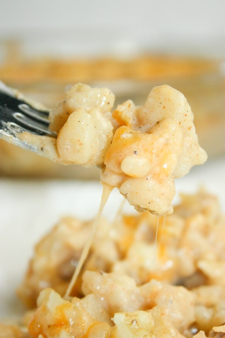 Hash Brown Casserole is an easy side dish that uses very few ingredients.  This dairy reduced recipe uses almond milk and gluten free flour as a thickener to create a gluten free version of the traditional 3 Ingredient Hash Brown Casserole.