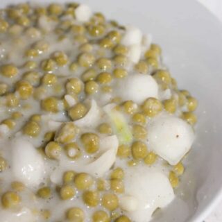 Creamed Peas is a quick side dish that can easily be whipped up on a busy week night.  This dairy free version also uses gluten free flour as a thickener.