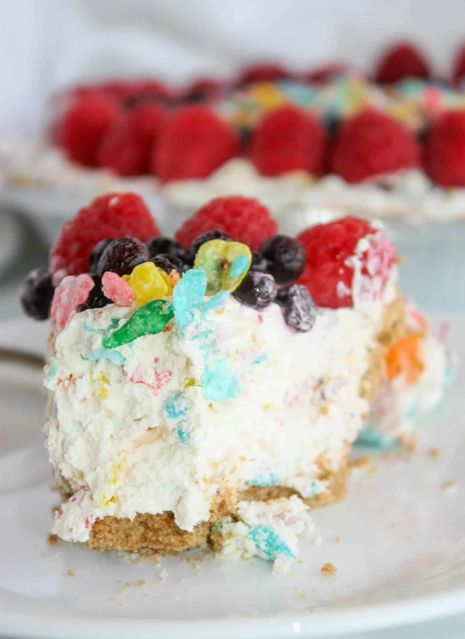 No Bake Fruity Pebbles Cheesecake is a colourful, delicious dessert option.  This gluten free, dairy reduced version is loaded with flavour as well as being pleasing to the eye.