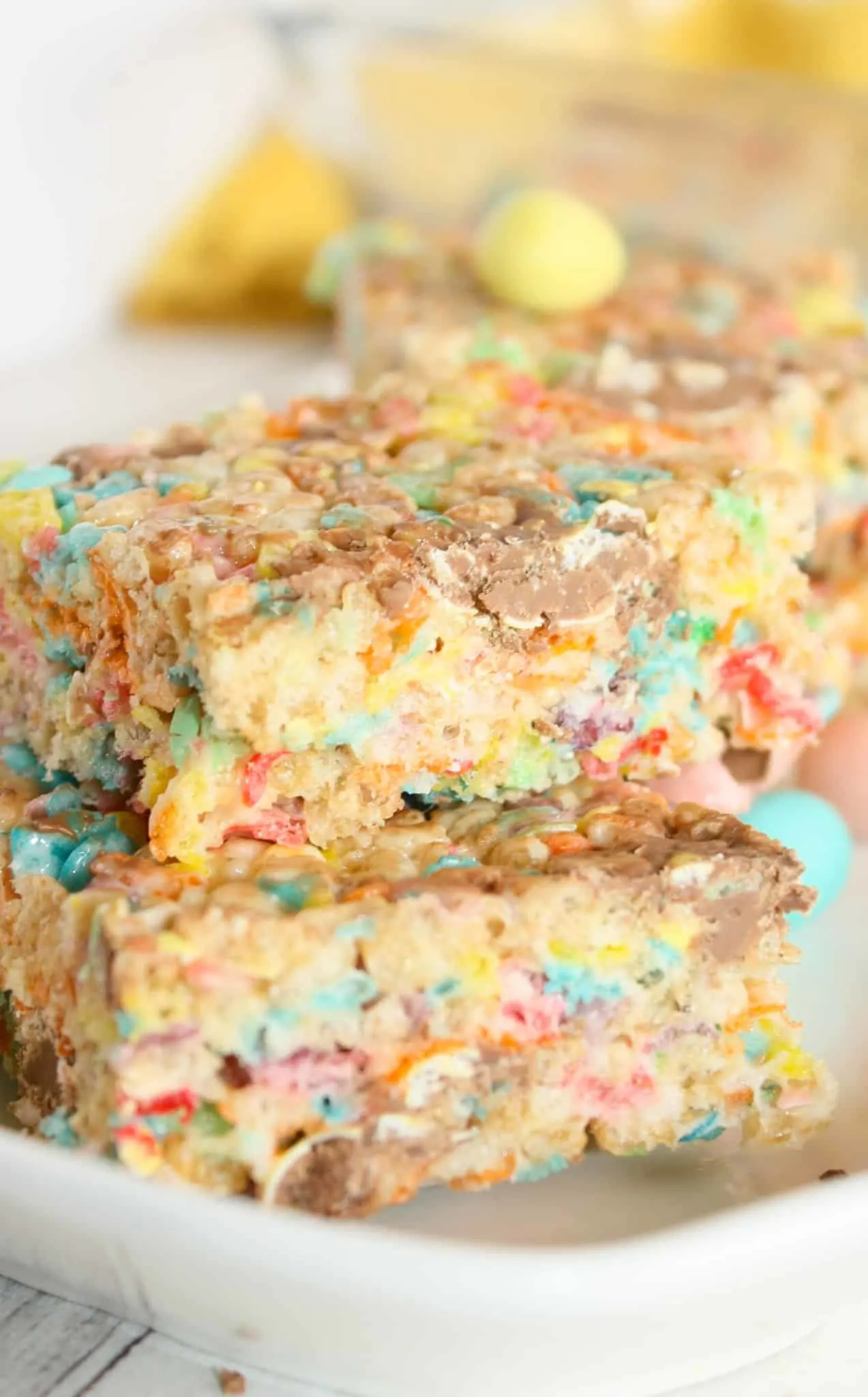 Fruity Pebbles Rice Crispy Treats are a delicious and colourful cereal square that can brighten up any dessert tray.