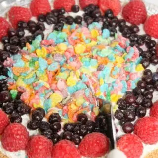 No Bake Fruity Pebbles Cheesecake is a colourful, delicious dessert option.  This gluten free, dairy reduced version is loaded with flavour as well as being pleasing to the eye.