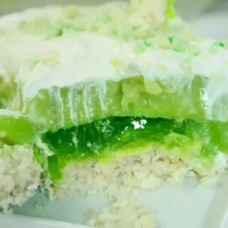 Layered Lime Dessert Squares are a nice light dessert option.  The layers of green make it the perfect choice for a St. Patrick's Day celebration.