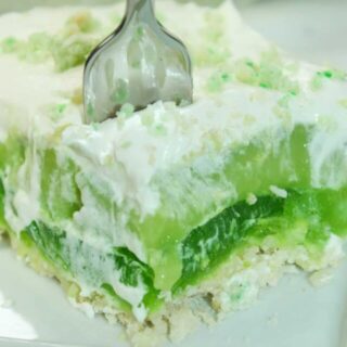Layered Lime Dessert Squares are a nice light dessert option.  The layers of green make it the perfect choice for a St. Patrick's Day celebration.