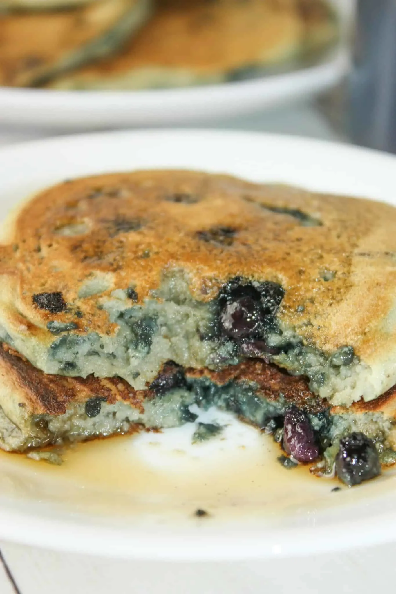 Gluten Free Blueberry Pancakes are a nice, light and fluffy breakfast choice.  Freeze any left overs for a quick reheat in the toaster.
