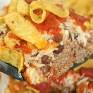 Another tasty variation of Hobo Casserole, is a spice upped version called Hobo Casserole Mexican Style. Loaded with ground beef, beans, rice, cheese and salsa it is a complete meal in one pan!