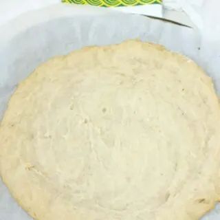 The parbaked pizza dough.