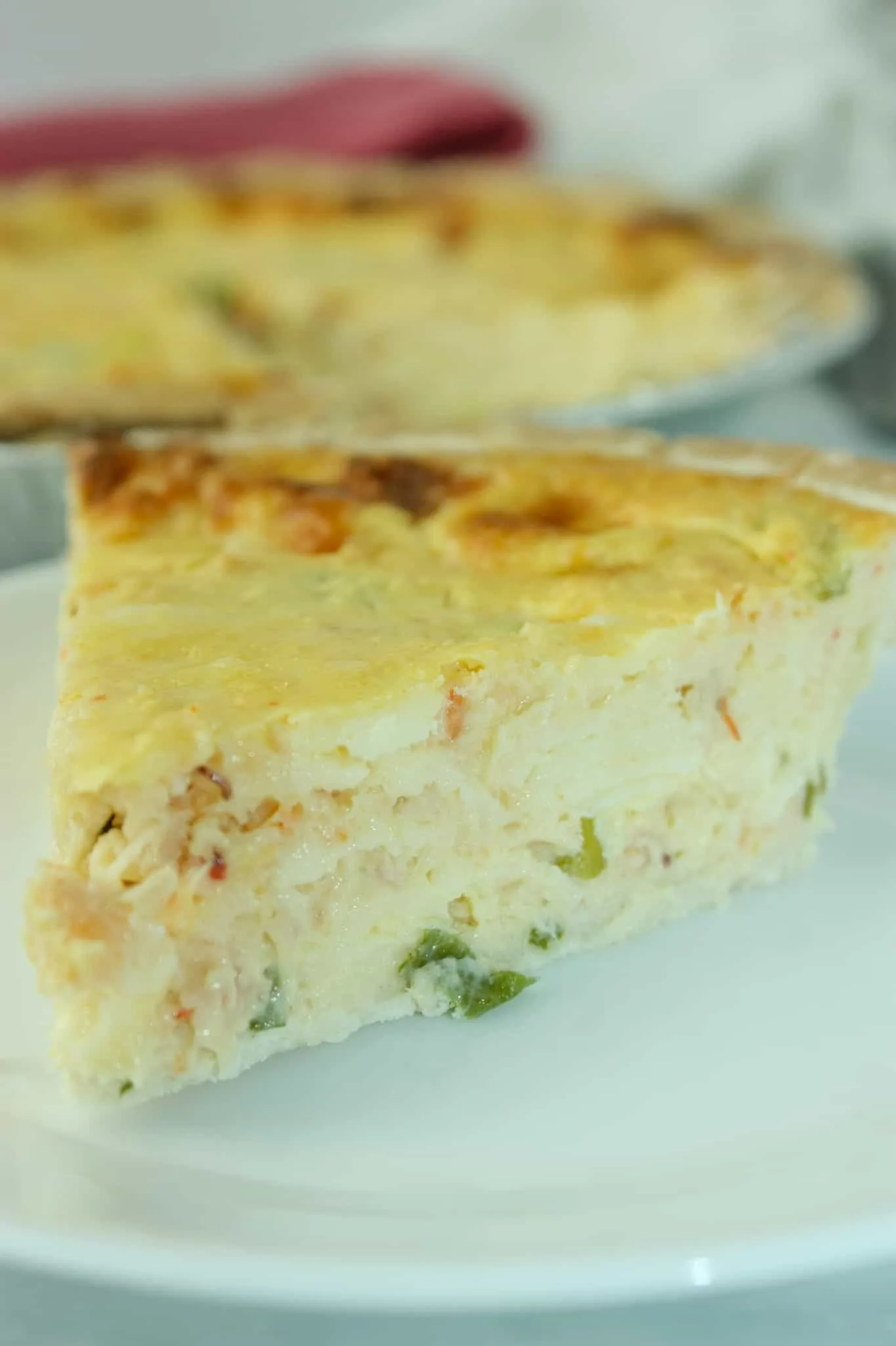 If you are looking for an easy quiche recipe, for your next brunch or light dinner, this is the perfect recipe for you!  This tasty Seafood Quiche is a great variation to serve up any time and make it gluten free with your choice of pie shell.