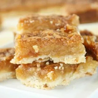 Get the delicious flavour of butter tarts without having to make any pastry.  This easy dessert recipe can quickly be cut up into bars and shared once cooled.
