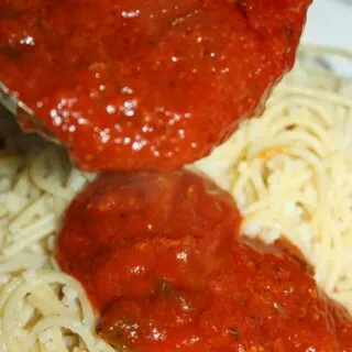 Growing up, so many Sunday dinners at our house were pasta and meatballs.  This family meal was always smothered with my Mother's homemade Spaghetti Sauce.