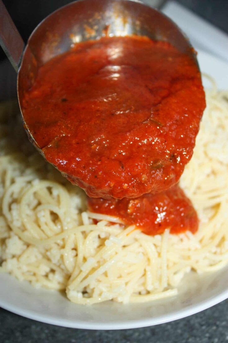 Growing up, so many Sunday dinners at our house were pasta and meatballs.  This family meal was always smothered with my Mother's homemade Spaghetti Sauce.