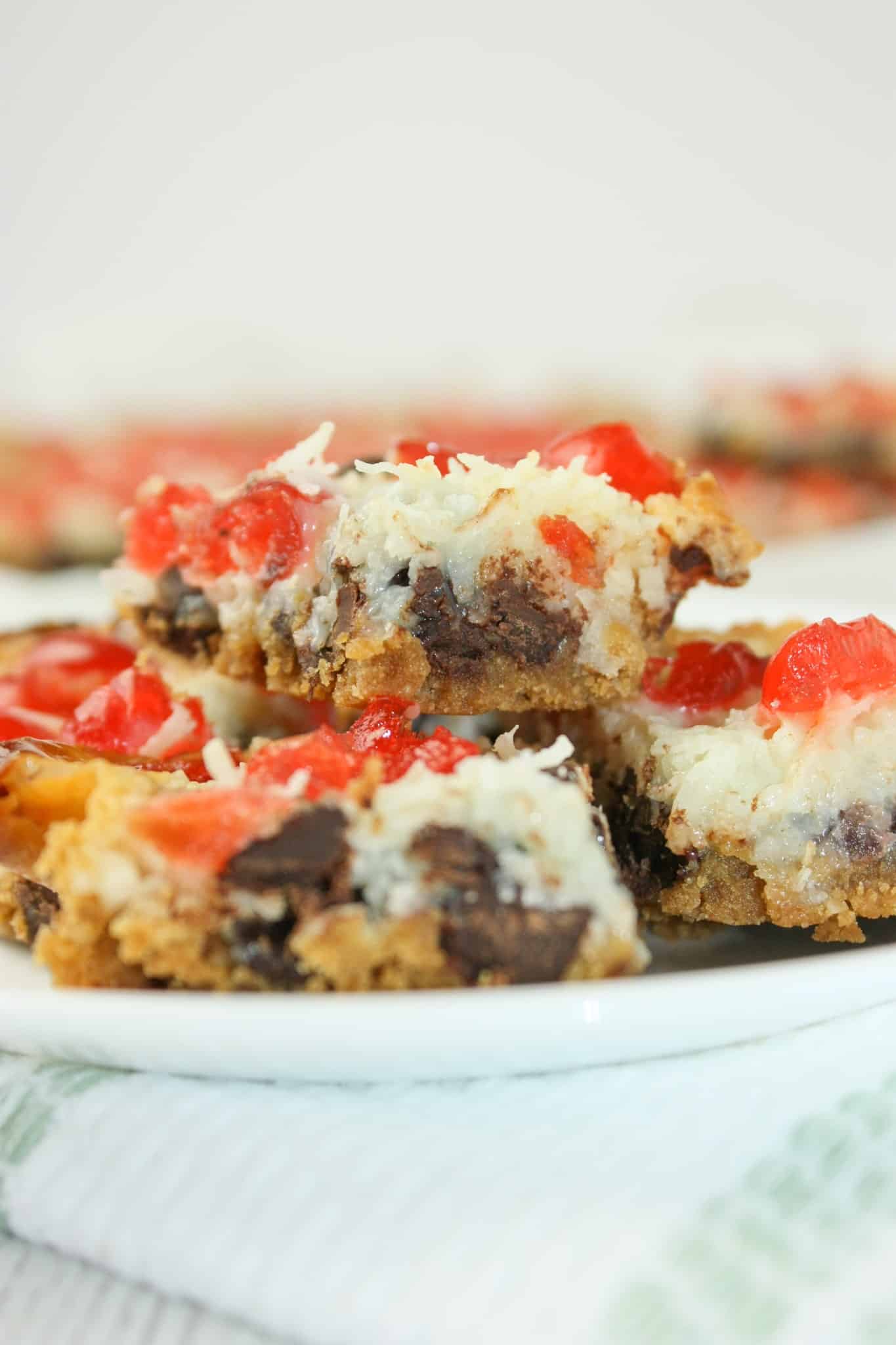 It is easy to make this traditional holiday treat gluten free by switching out the graham crumbs.  Magic Cookie Bars were always on our Christmas dessert trays growing up so this year I decided to add them to mine!